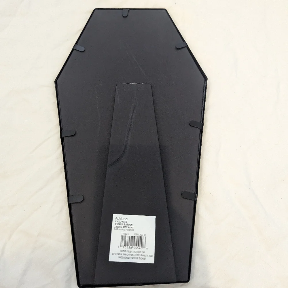 Coffin shaped framed mirror